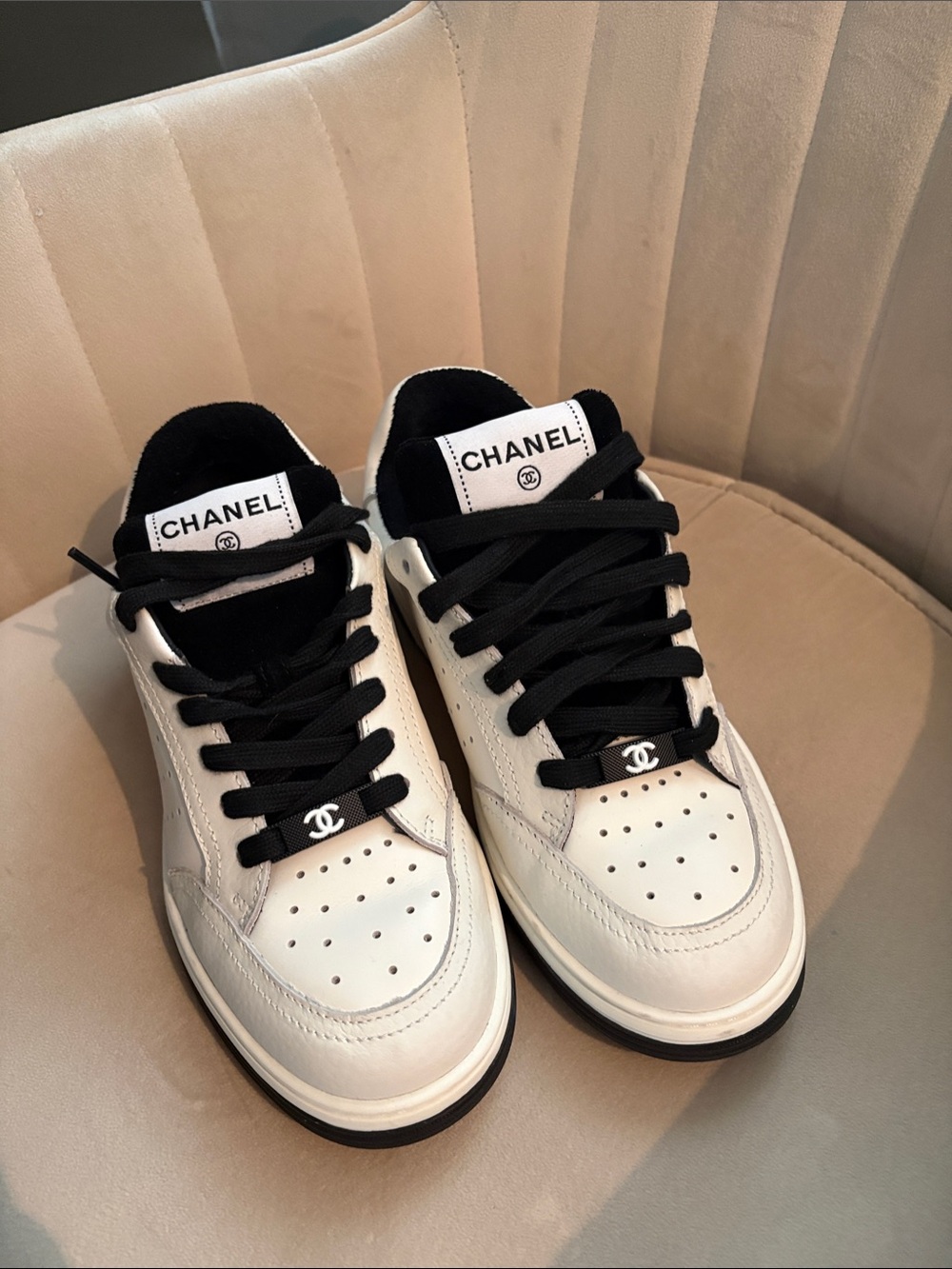 CHANEL White Leather Sneakers with Black Accents